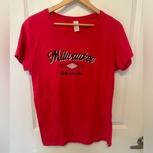 Hot pink women’s Milwaukee size large tshirt. Glitter detail